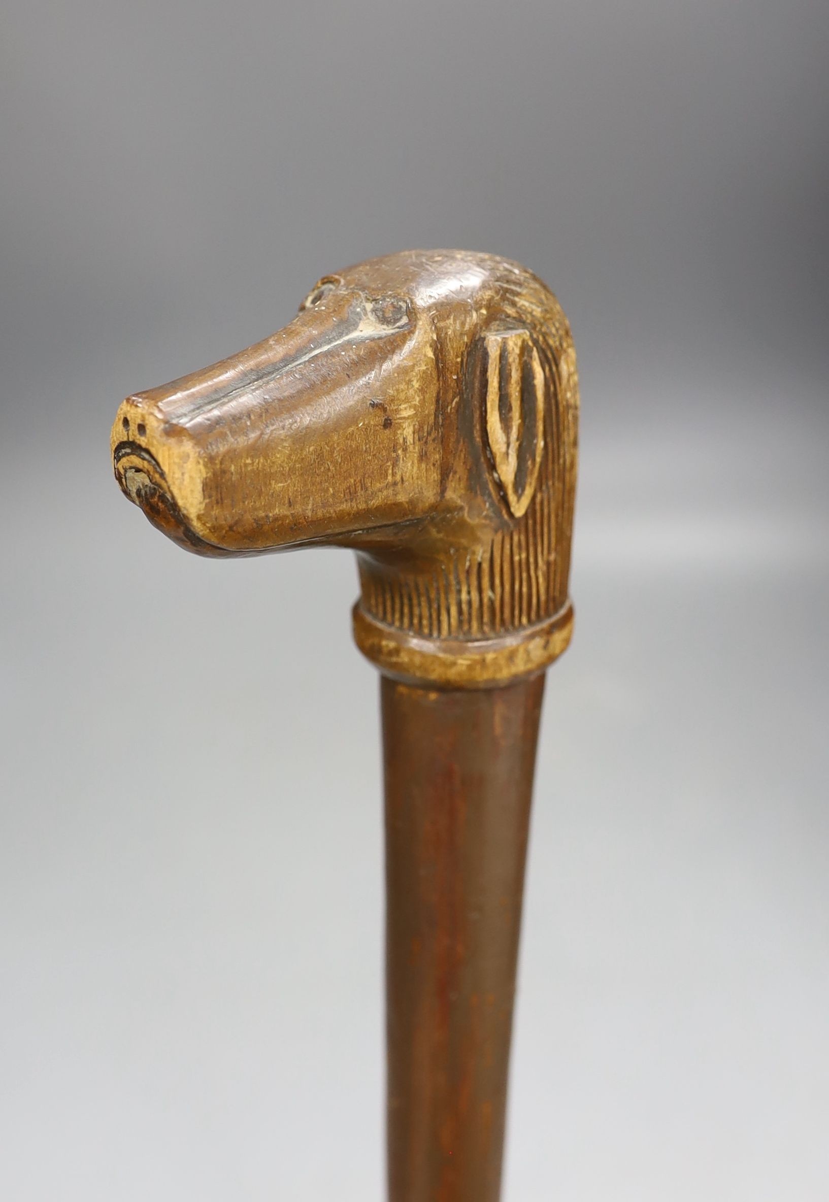 A Folk art carved dog-head walking cane - 92.5cm